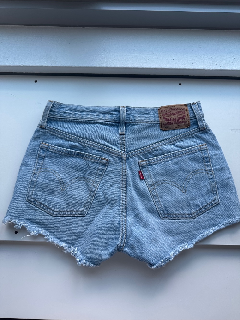Levi's Light Blue Denim Frayed Hem High-Rise Cutoff Shorts